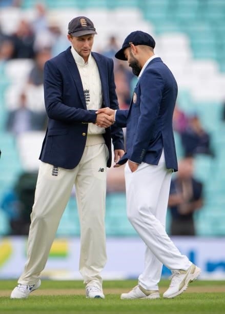 England captain Joe Root and India captain Virat Kohli shake hands after the coin toss prior to the Fourth LV= Insurance Test Match: Day One between...