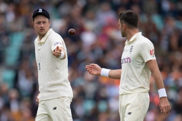 Ollie Robinson of England throws the ball to James Anderson during the Fourth LV= Insurance Test Match: Day One between England and India at The Kia...