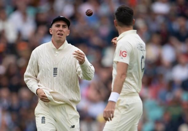 Dan Lawrence of England throws the ball to James Anderson during the Fourth LV= Insurance Test Match: Day One between England and India at The Kia...