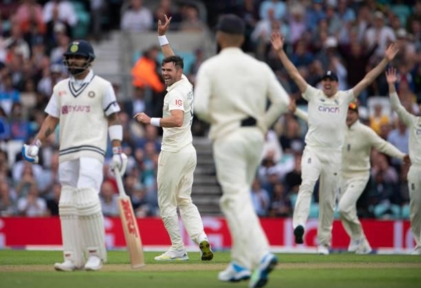 James Anderson of England celebrates taking the wicket of Cheteshwar Pujara of India during the Fourth LV= Insurance Test Match: Day One between...