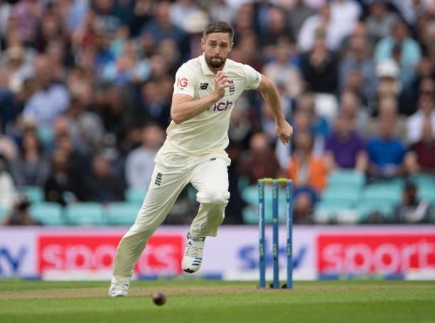 Chris Woakes of England fields off his own bowling during the Fourth LV= Insurance Test Match: Day One between England and India at The Kia Oval on...