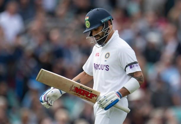 Virat Kohli of India walsk from the pitch after losing his wicket to Ollie Robinson of England during the Fourth LV= Insurance Test Match: Day One...