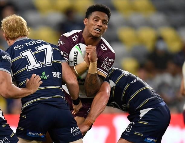Jason Saab of the Sea Eagles is tackled during the round 25 NRL match between the North Queensland Cowboys and the Manly Sea Eagles at QCB Stadium,...