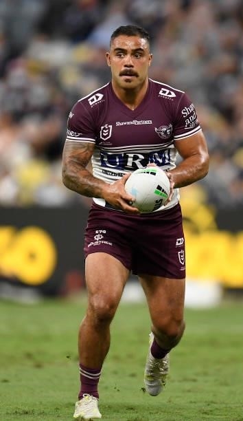 Dylan Walker of the Sea Eagles runs the ball during the round 25 NRL match between the North Queensland Cowboys and the Manly Sea Eagles at QCB...
