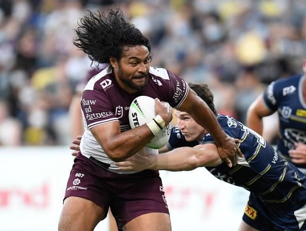 Toafofoa Sipley of the Sea Eagles is tackled by Ben Condon of the Cowboys during the round 25 NRL match between the North Queensland Cowboys and the...