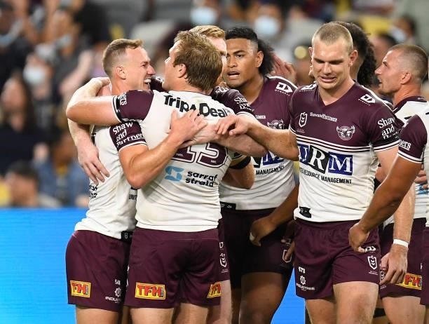 Jake Trbojevic of the Sea Eagles celebrates after scoring a try during the round 25 NRL match between the North Queensland Cowboys and the Manly Sea...