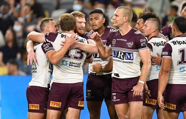 Jake Trbojevic of the Sea Eagles celebrates after scoring a try during the round 25 NRL match between the North Queensland Cowboys and the Manly Sea...