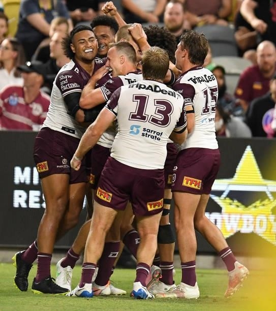 Tom Trbojevic of the Sea Eagles celebrates after scoring a try during the round 25 NRL match between the North Queensland Cowboys and the Manly Sea...