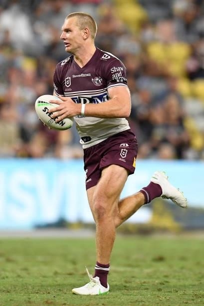 Tom Trbojevic of the Sea Eagles makes a break during the round 25 NRL match between the North Queensland Cowboys and the Manly Sea Eagles at QCB...