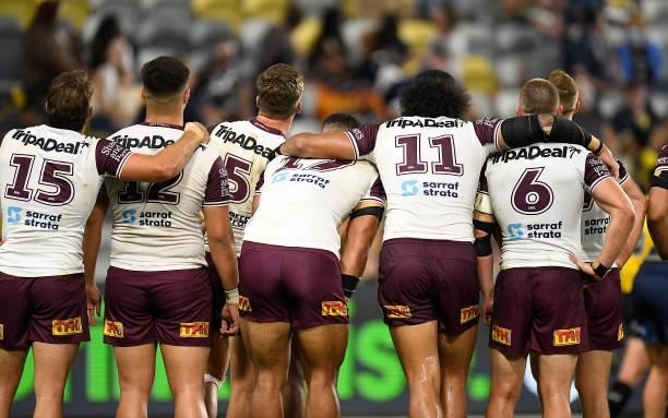 The Sea Eagles look up at a replay on the big screen after a try during the round 25 NRL match between the North Queensland Cowboys and the Manly Sea...