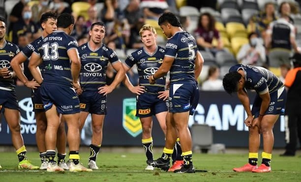 The Cowboys look dejected after losing the round 25 NRL match between the North Queensland Cowboys and the Manly Sea Eagles at QCB Stadium, on...