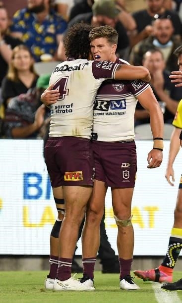 Reuben Garrick of the Sea Eagles celebrates after scoring a try during the round 25 NRL match between the North Queensland Cowboys and the Manly Sea...