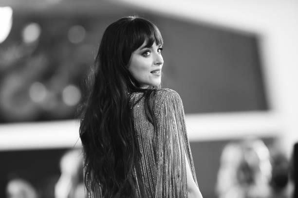 This image has been converted in black and white ] Dakota Johnson attends the red carpet of the movie "The Lost Daughter