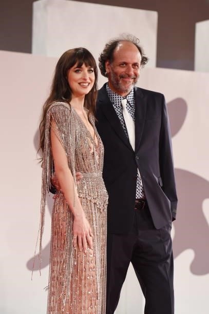Dakota Johnson and Luca Guadagnino attend the red carpet of the movie "The Lost Daughter