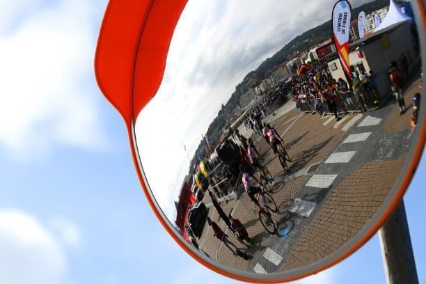 Mirror shows the reflection of the riders of the Team Lotto Soudal prepare for the race prior to the 76th Tour of Spain 2021, Stage 20 a 202,2km km...