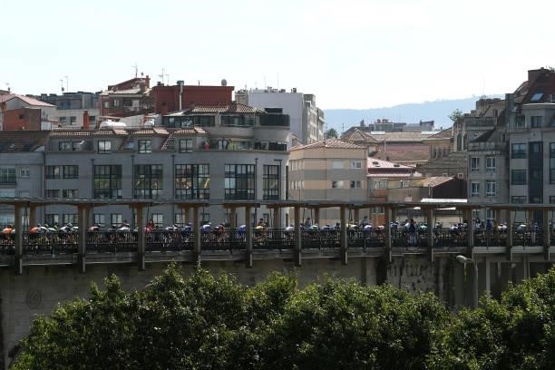 General view of the peloton passing through Pontevedra city during the 76th Tour of Spain 2021, Stage 20 a 202,2km km stage from Sanxenxo to Mos....