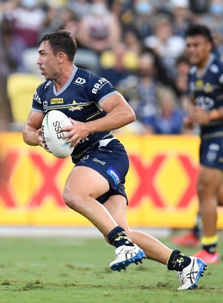 Reece Robson of the Cowboys runs the ball during the round 25 NRL match between the North Queensland Cowboys and the Manly Sea Eagles at QCB Stadium,...