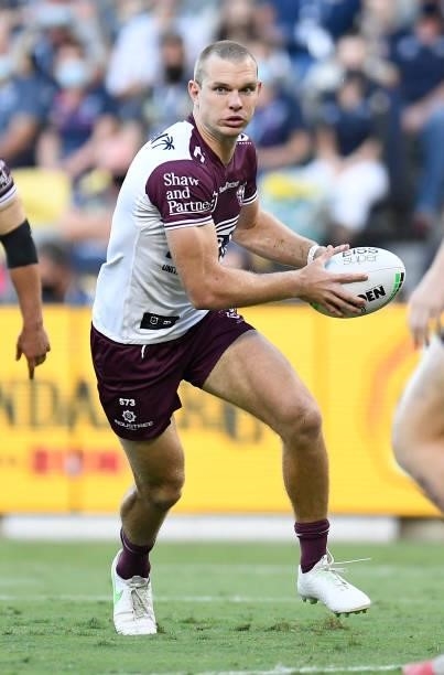 Tom Trbojevic of the Sea Eagles runs the ball during the round 25 NRL match between the North Queensland Cowboys and the Manly Sea Eagles at QCB...