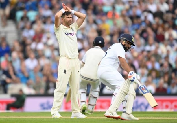 James Anderson of England looks on as the India batsmen run during the third day of the 4th LV= Test Match between England and India at The Kia Oval...