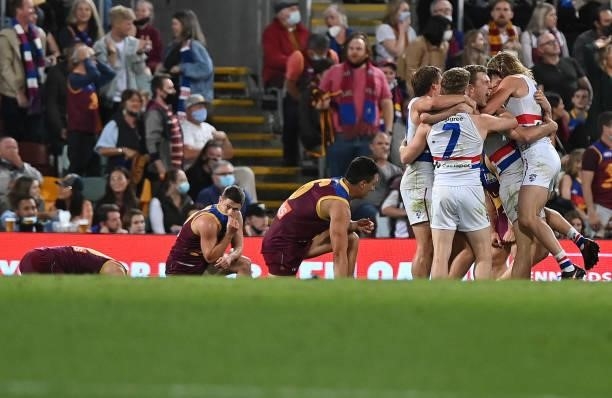 The Bulldogs celebrate after they defeated the Lions during the AFL First Semi Final Final match between Brisbane Lions and the Western Bulldogs at...