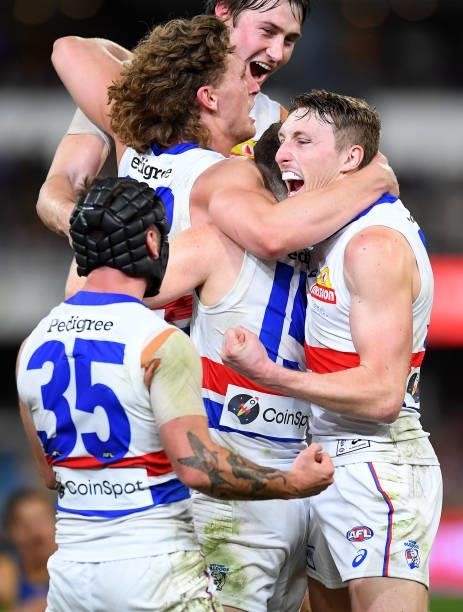 Western Bulldogs celebrate victory during the AFL 1st Semi Final match between the Brisbane Lions and the Western Bulldogs at The Gabba on September...