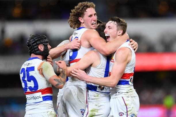 Western Bulldogs celebrate victory during the AFL 1st Semi Final match between the Brisbane Lions and the Western Bulldogs at The Gabba on September...