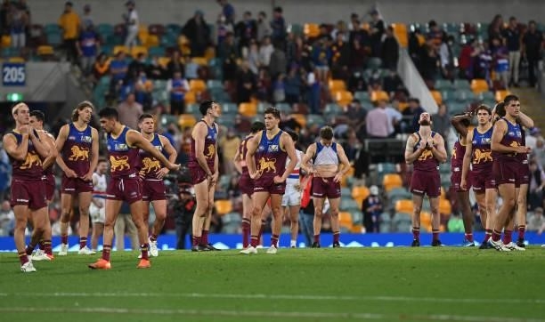The Lions are dejected after they were defeated by the Bulldogs during the AFL First Semi Final Final match between Brisbane Lions and the Western...