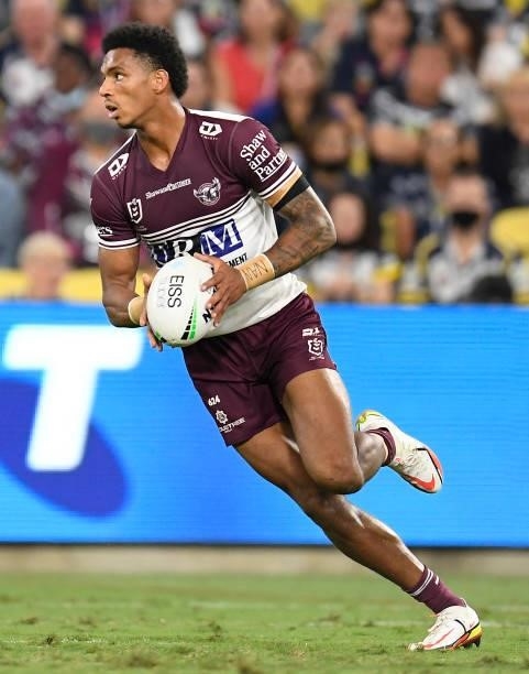 Jason Saab of the Sea Eagles runs the ball during the round 25 NRL match between the North Queensland Cowboys and the Manly Sea Eagles at QCB...