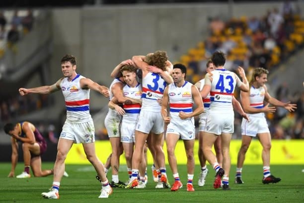 Western Bulldogs celebrate their victory during the AFL 1st Semi Final match between the Brisbane Lions and the Western Bulldogs at The Gabba on...