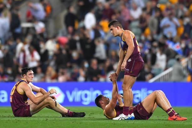 Brisbane Lions look dejected after their defeat during the AFL 1st Semi Final match between the Brisbane Lions and the Western Bulldogs at The Gabba...