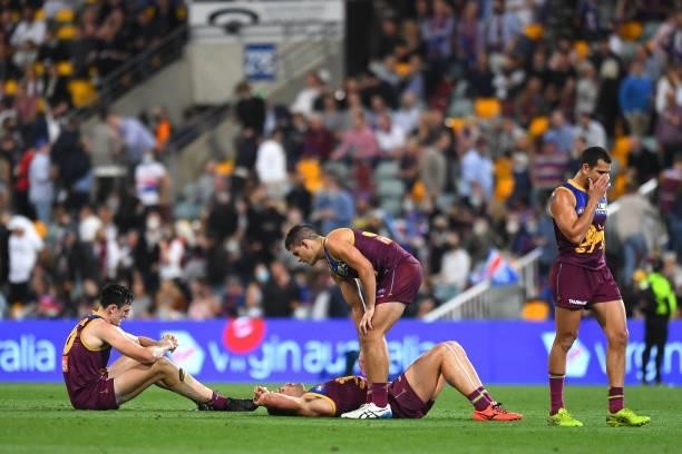 Brisbane Lions look dejected after their defeat during the AFL 1st Semi Final match between the Brisbane Lions and the Western Bulldogs at The Gabba...