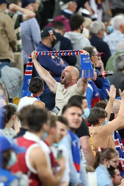 Bulldogs fans cheer winning the AFL 1st Semi Final match between Brisbane Lions and the Western Bulldogs at The Gabba on September 04, 2021 in...