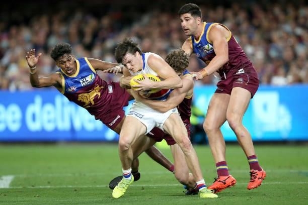 Laitham Vandermeer of the Bulldogs is tackled during the AFL 1st Semi Final match between Brisbane Lions and the Western Bulldogs at The Gabba on...