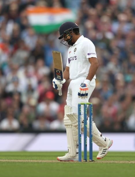 Rohit Sharma of India celebrates his fifty runs during day three of the fourth LV= Insurance Test match between England and India at The Kia Oval on...