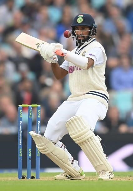 Cheteshwar Pujara of India prepares to play a ramp shot during the third day of the 4th LV= Test Match between England and India at The Kia Oval on...