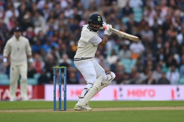 Cheteshwar Pujara of India cuts for four during the Fourth LV= Insurance Test Match: Day Three between England and India at The Kia Oval on September...