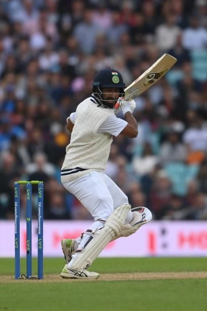 Cheteshwar Pujara of India cuts for four during the Fourth LV= Insurance Test Match: Day Three between England and India at The Kia Oval on September...