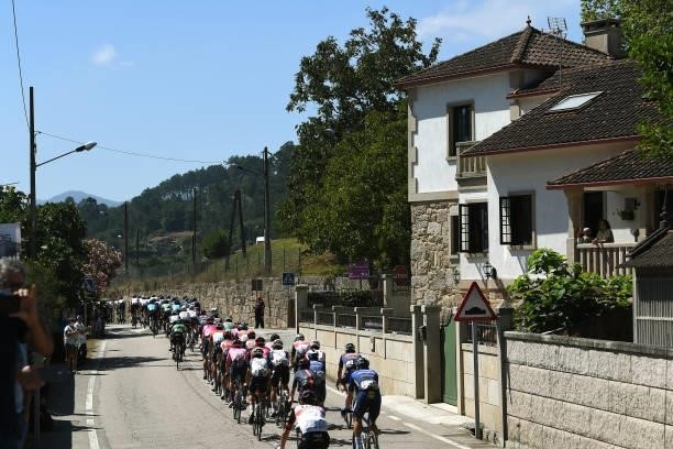 General view of the peloton compete during the 76th Tour of Spain 2021, Stage 20 a 202,2km km stage from Sanxenxo to Mos. Alto Castro de Herville...