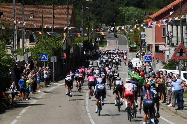 General view of the peloton passing through Mos village during the 76th Tour of Spain 2021, Stage 20 a 202,2km km stage from Sanxenxo to Mos. Alto...
