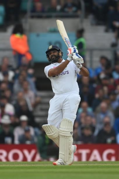 Rohit Sharma of India hits a six to brng up his century during the Fourth LV= Insurance Test Match: Day Three between England and India at The Kia...