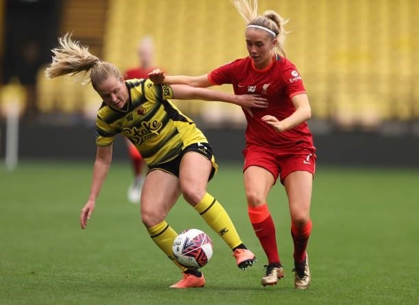 Missy-Bo Kearns of Liverpool challenges Anne Meiwald of Watford during the Barclays FA Women's Championship match between Watford Ladies and...