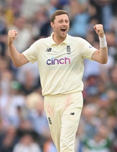 Ollie Robinson of England celebrates after dismissing Rohit Sharma during the third day of the 4th LV= Test Match between England and India at The...