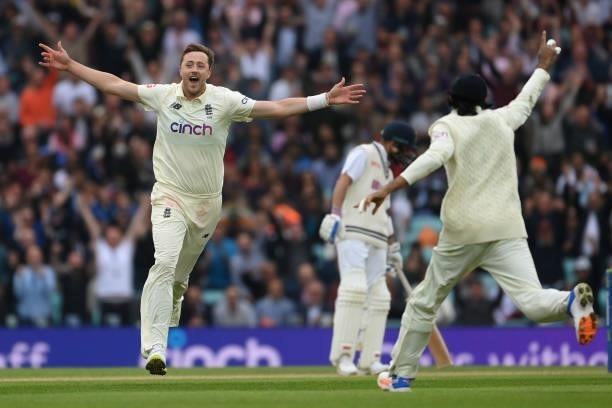 Ollie Robinson of England celebrates with Haseeb Hameed after dismissing Cheteshwar Pujara of India during the Fourth LV= Insurance Test Match: Day...