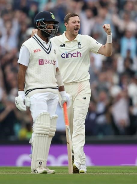 Ollie Robinson of England celebrates taking the wicket of Rohit Sharma of India during day three of the fourth LV= Insurance Test match between...