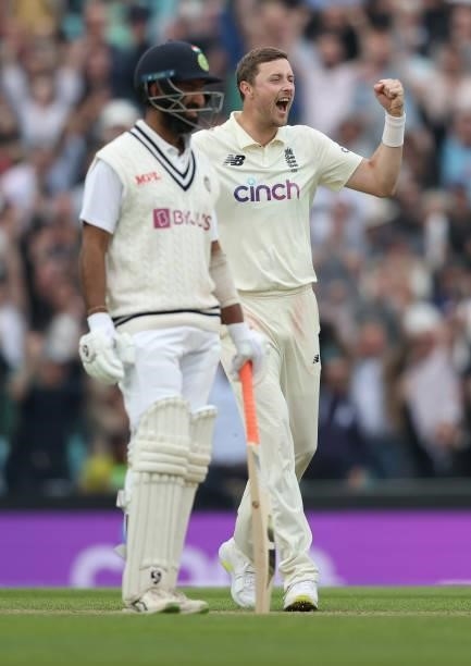 Ollie Robinson of England celebrates taking the wicket of Rohit Sharma of India during day three of the fourth LV= Insurance Test match between...