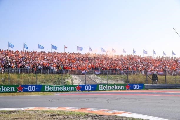 Fans and supporters in mostly orange suits watching Max Verstappen during the Qualification of F1 Grand Prix of The Netherlands at Circuit Zandvoort...