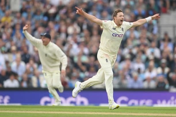 Ollie Robinson of England celebrates after dismissing Cheteshwar Pujara of India during the third day of the 4th LV= Test Match between England and...