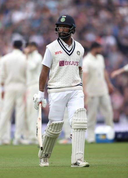 Cheteshwar Pujara of India walks off after losing his wicket during day three of the fourth LV= Insurance Test match between England and India at The...