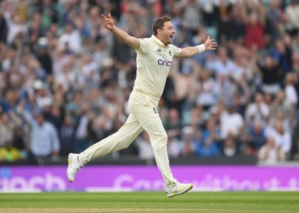 Ollie Robinson of England celebrates after dismissing Cheteshwar Pujara of India during the third day of the 4th LV= Test Match between England and...