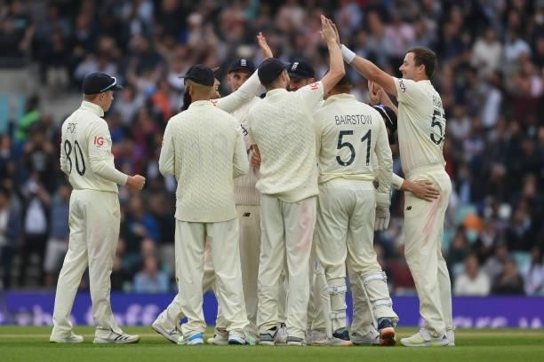 Ollie Robinson of England celebrates with team mates after dismissing Cheteshwar Pujara of India during the Fourth LV= Insurance Test Match: Day...